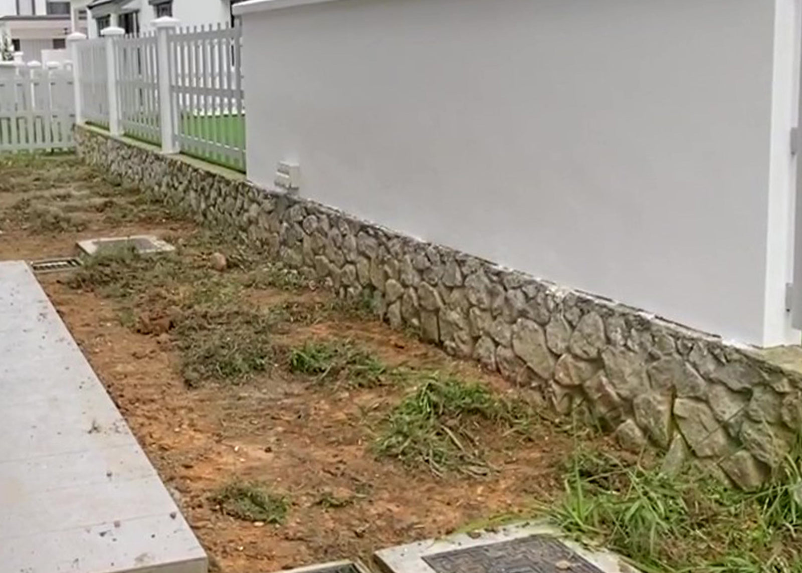 Before installation: an unused side-yard space